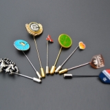 Pins & mehr GmbH & Co. KG  -  Pins Anstecker Kühlschrank-Magnete Klatschstangen Einkaufswagenchips - Pins & mehr GmbH & Co. KG